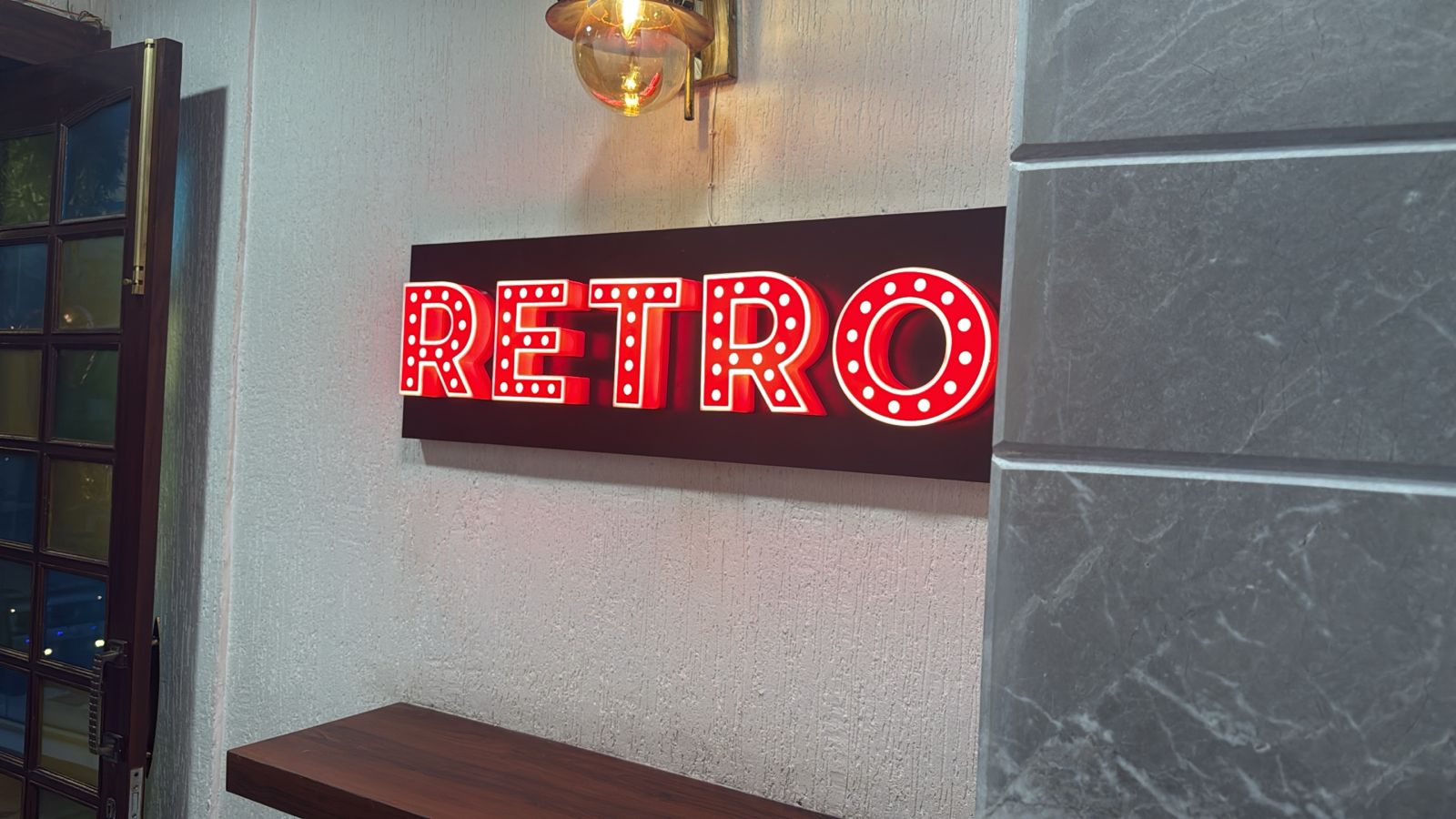 Retro Fine Dine neon arrival sign